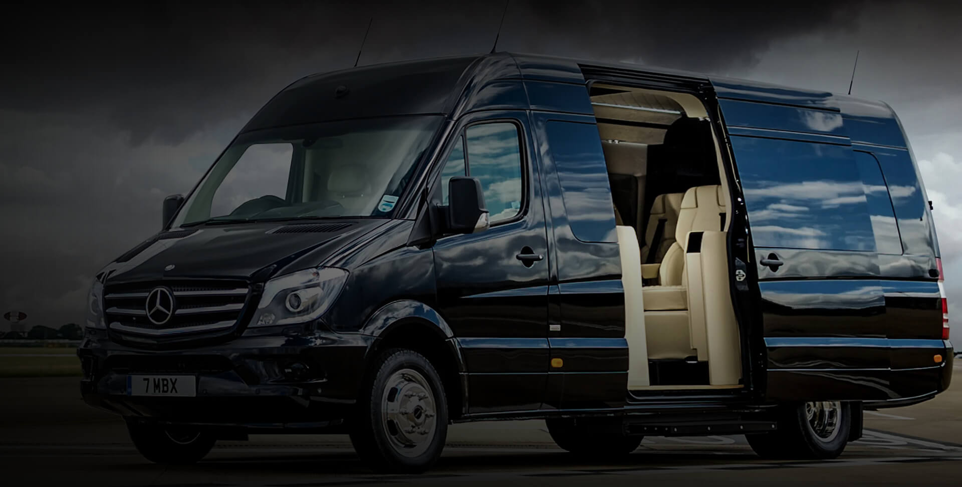 black sprinter van with opened door