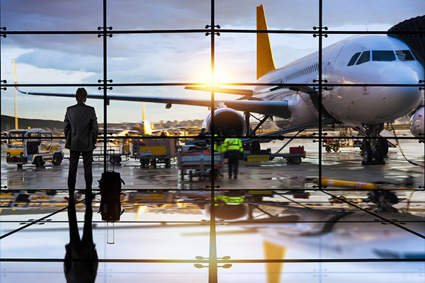 man standing inside the airport